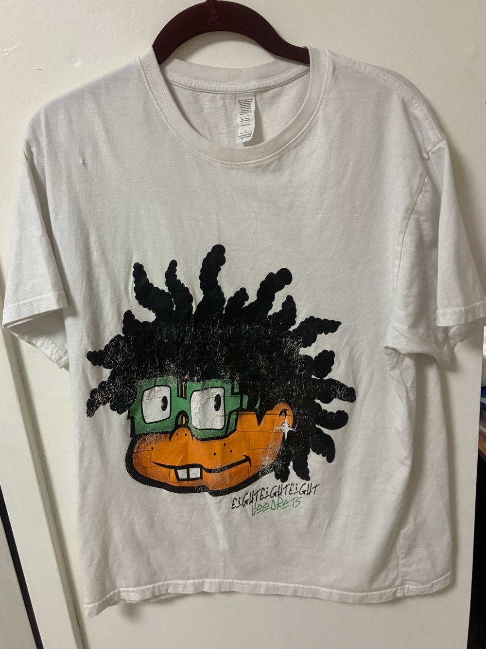 Kids White Graphic Tee with Orange Character and Black Hair